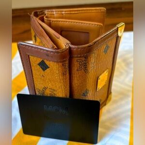 MCM Tri-Fold Compact Cognac Wallet W/ Monogram